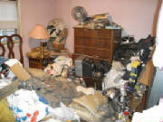 cluttered-packed-junk-filled-apartment.jpg